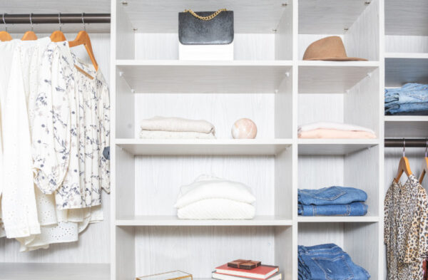 White shelving with assorted accessories displayed